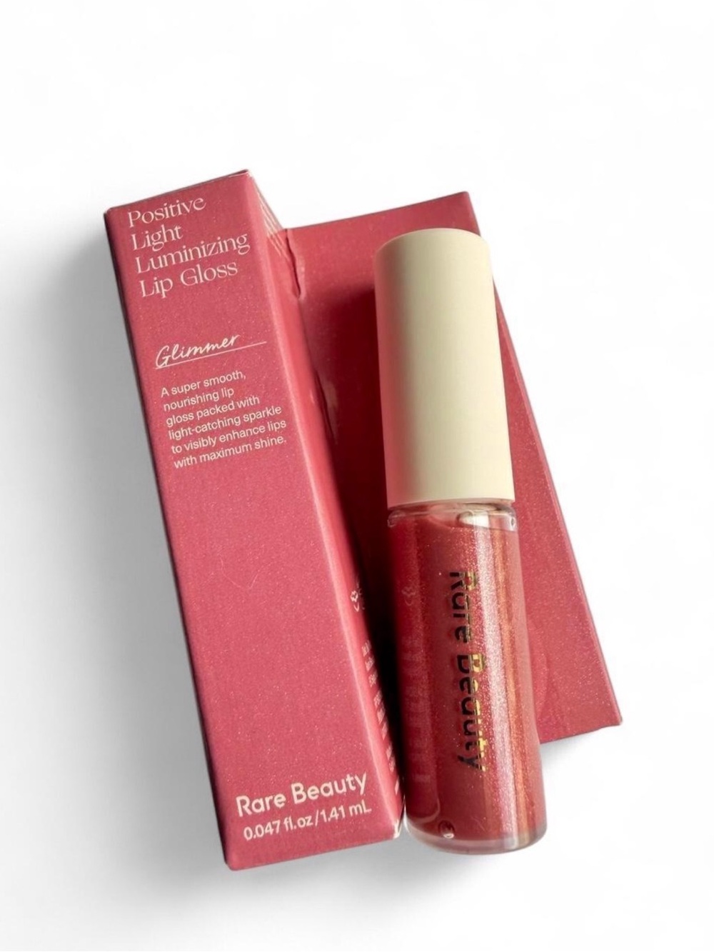 Rare Beauty Positive Light Luminizing Lip Gloss — Glimmer (shimmery pink)